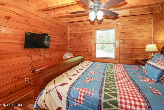 556 Wildwood Forest Way, Sevierville, TN 37876 - bedroom featuring wooden walls, wooden ceiling with exposed beams, and wood finished floors