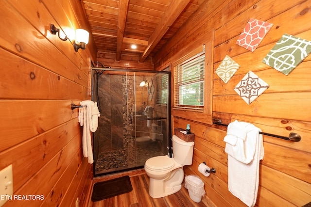 556 Wildwood Forest Way, Sevierville, TN 37876 - full bath with wooden walls, wooden ceiling with exposed beams, toilet, a stall shower, and wood finished floors