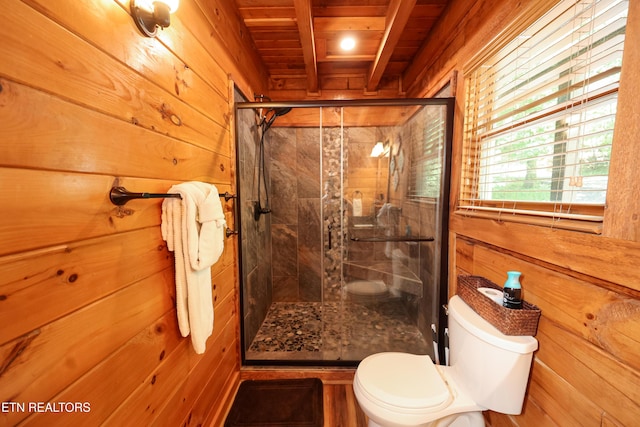 556 Wildwood Forest Way, Sevierville, TN 37876 - bathroom featuring wooden ceiling, toilet, wooden walls, and a stall shower