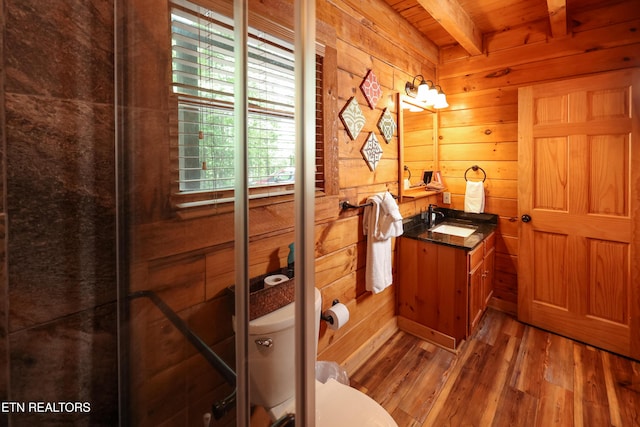 556 Wildwood Forest Way, Sevierville, TN 37876 - bathroom with wood walls, vanity, wood finished floors, wood ceiling with exposed beams, and toilet