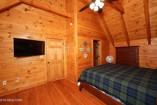 556 Wildwood Forest Way, Sevierville, TN 37876 - bedroom featuring hardwood / wood-style floors, wooden ceiling, and wood walls