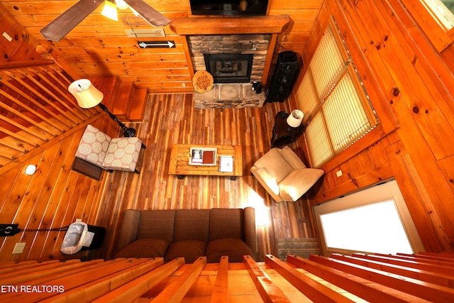 556 Wildwood Forest Way, Sevierville, TN 37876 - unfurnished living room with wood walls