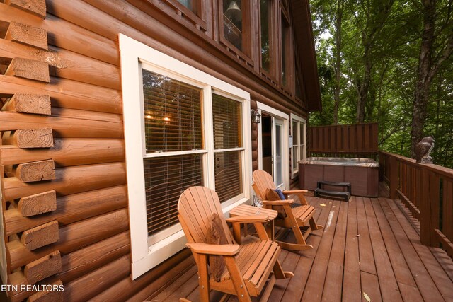 556 Wildwood Forest Way, Sevierville, TN 37876 - deck featuring a hot tub