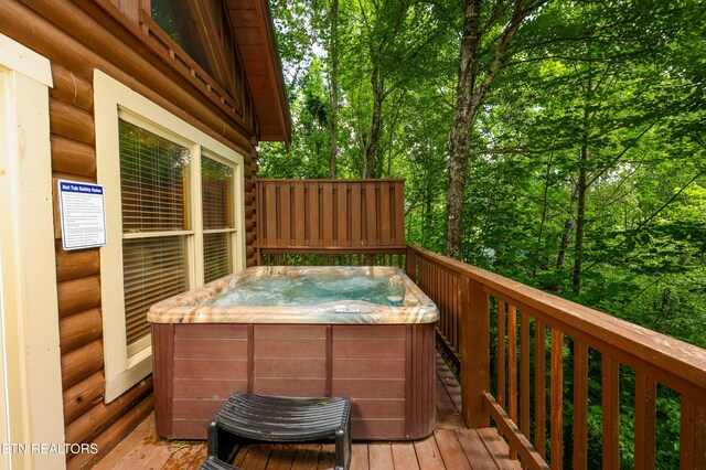 556 Wildwood Forest Way, Sevierville, TN 37876 - deck featuring a hot tub