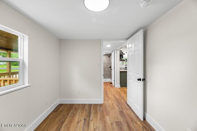 501 Dodson Ave, Englewood, TN 37329 - unfurnished room with baseboards, light wood-style floors, and recessed lighting