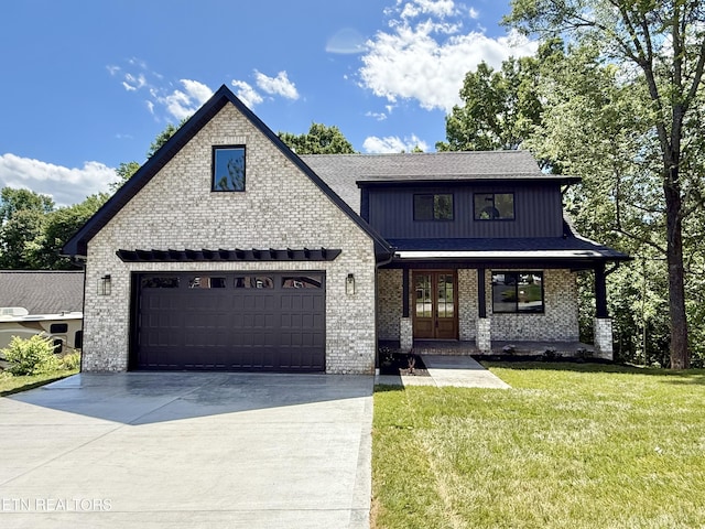 8349 Cliff Ridge Ct, Corryton, TN 37721 - view of front of home featuring a front lawn, driveway, covered porch, an attached garage, and brick siding