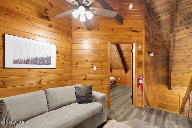 4372 Boogertown Rd Apt 3, Sevierville, TN 37876 - living room featuring wood walls, a ceiling fan, and wood finished floors