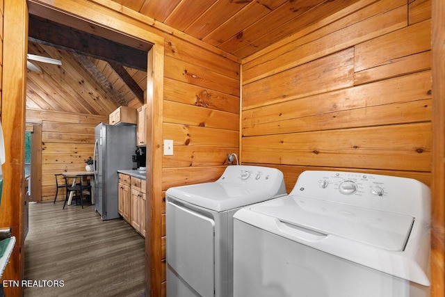 4372 Boogertown Rd Apt 3, Sevierville, TN 37876 - washroom with wooden ceiling, wooden walls, washer and clothes dryer, and dark wood-style flooring