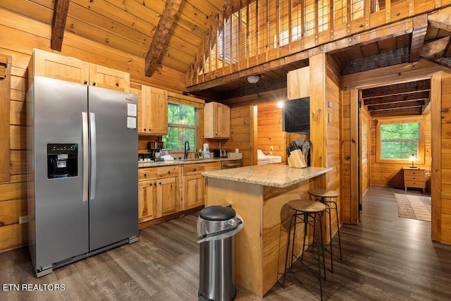 4372 Boogertown Rd Apt 3, Sevierville, TN 37876 - kitchen with stainless steel appliances, wooden walls, high vaulted ceiling, dark wood-style floors, and healthy amount of natural light