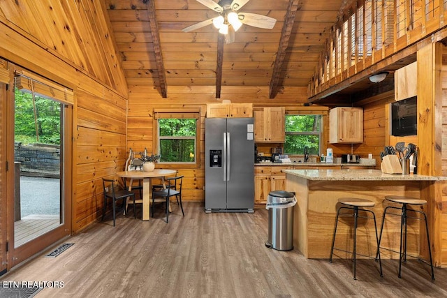 4372 Boogertown Rd Apt 3, Sevierville, TN 37876 - kitchen with stainless steel fridge, light wood-style flooring, wood ceiling, plenty of natural light, and wooden walls