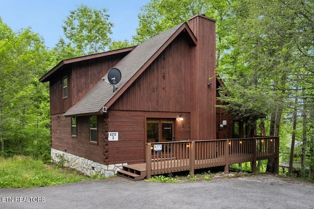 4372 Boogertown Rd Apt 3, Sevierville, TN 37876 - view of front of property featuring a shingled roof and a chimney