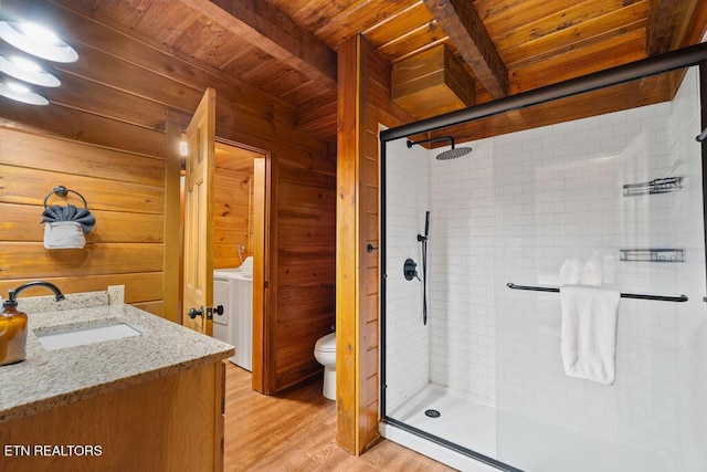 4372 Boogertown Rd Apt 2, Sevierville, TN 37876 - bathroom with wooden ceiling with exposed beams, wood finished floors, toilet, a shower stall, and wood walls