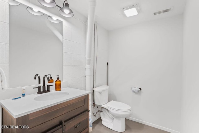 4372 Boogertown Rd Apt 2, Sevierville, TN 37876 - bathroom with vanity, toilet, and baseboards