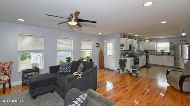 106 Alfred Mccammon Rd, Maryville, TN 37804 - living room featuring plenty of natural light, light wood finished floors, recessed lighting, and a ceiling fan