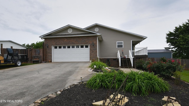 106 Alfred Mccammon Rd, Maryville, TN 37804 - view of front of home with brick siding, driveway, and an attached garage