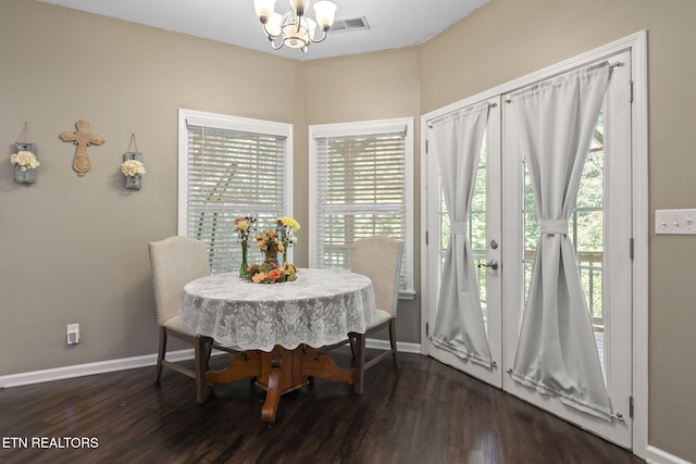 376 Old Holderford Rd, Kingston, TN 37763 - dining space featuring a chandelier, dark wood-type flooring, and baseboards