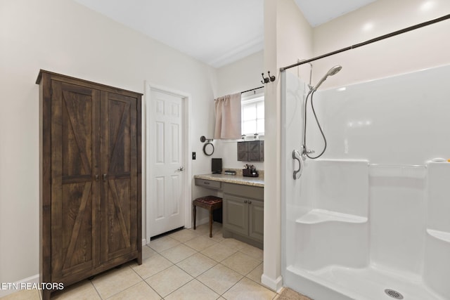 376 Old Holderford Rd, Kingston, TN 37763 - bathroom featuring a shower, vanity, tile patterned flooring, and baseboards