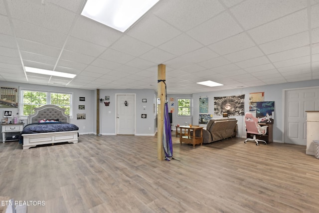 376 Old Holderford Rd, Kingston, TN 37763 - living area with wood finished floors, a drop ceiling, and baseboards