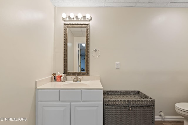 376 Old Holderford Rd, Kingston, TN 37763 - bathroom featuring toilet, vanity, baseboards, and wood finished floors