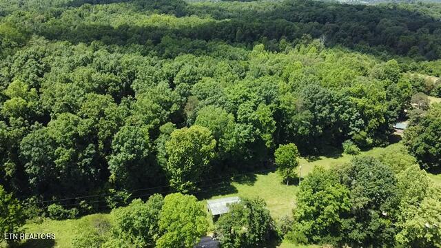 547 Knob Rd, Vonore, TN 37885 - aerial view of property and surrounding area with a heavily wooded area