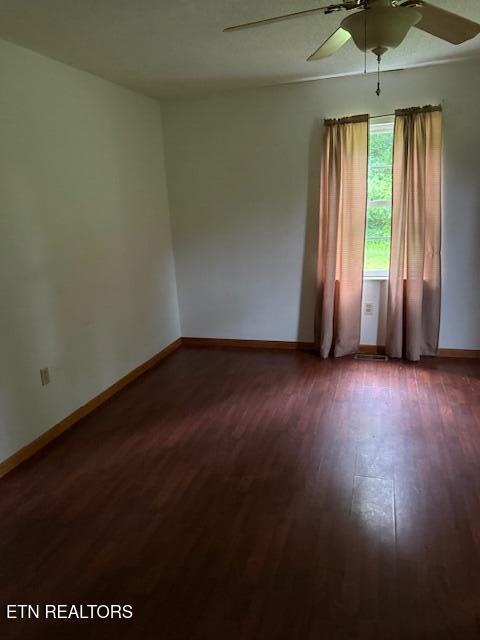 547 Knob Rd, Vonore, TN 37885 - spare room with ceiling fan, wood finished floors, and baseboards
