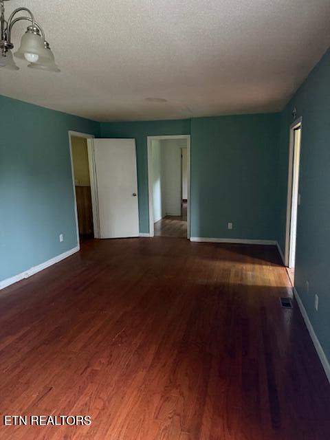 547 Knob Rd, Vonore, TN 37885 - spare room featuring wood finished floors and baseboards