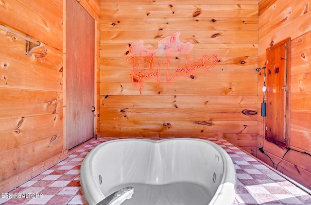 1513 Tyler Way, Sevierville, TN 37876 - full bath with tile patterned floors, a tub with jets, and wooden walls