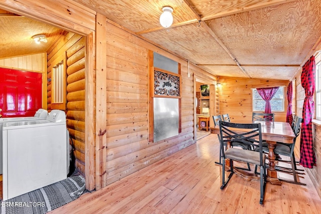 1513 Tyler Way, Sevierville, TN 37876 - dining area with wood walls, wood finished floors, and separate washer and dryer