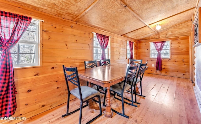 1513 Tyler Way, Sevierville, TN 37876 - dining room with vaulted ceiling, light wood finished floors, wood walls, and wooden ceiling