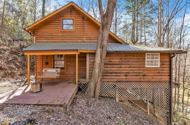 1513 Tyler Way, Sevierville, TN 37876 - rear view of property featuring faux log siding and metal roof