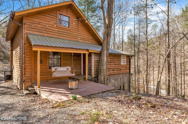 1513 Tyler Way, Sevierville, TN 37876 - view of front of property with faux log siding and metal roof