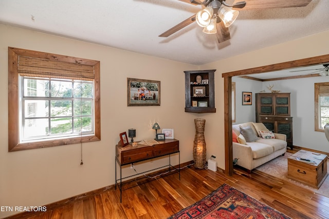 1932 Duncan Rd, Knoxville, TN 37919 - sitting room featuring a ceiling fan, wood finished floors, and baseboards