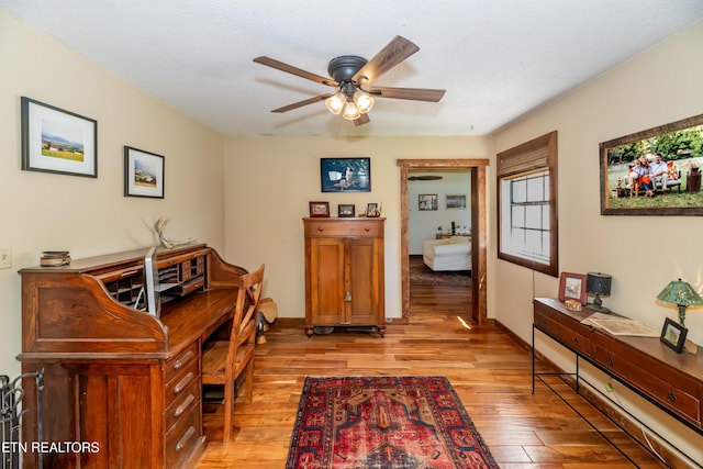 1932 Duncan Rd, Knoxville, TN 37919 - office with light wood-style flooring, ceiling fan, and baseboards