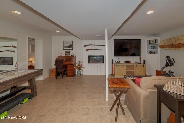 1932 Duncan Rd, Knoxville, TN 37919 - tiled living room with a glass covered fireplace and recessed lighting