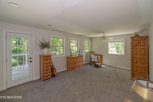 1932 Duncan Rd, Knoxville, TN 37919 - living area with carpet flooring, a ceiling fan, and baseboards