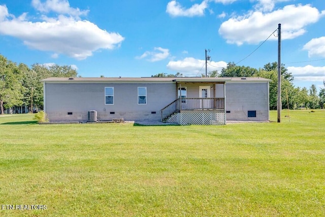 3841 Mcbroom Chapel Rd, Cookeville, TN 38501 - back of property with crawl space, a yard, and central air condition unit