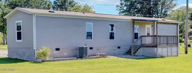 3841 Mcbroom Chapel Rd, Cookeville, TN 38501 - back of house with crawl space, a yard, and central AC unit