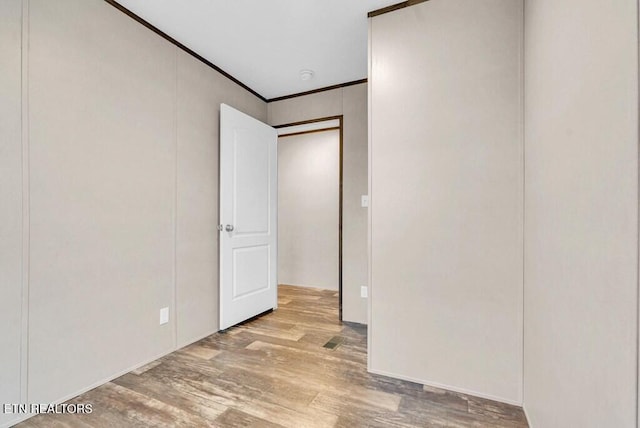 3841 Mcbroom Chapel Rd, Cookeville, TN 38501 - unfurnished room featuring wood finished floors and crown molding