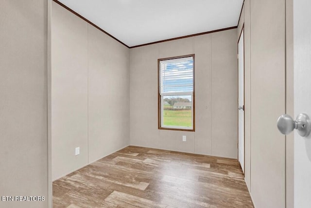 3841 Mcbroom Chapel Rd, Cookeville, TN 38501 - empty room featuring wood finished floors and crown molding