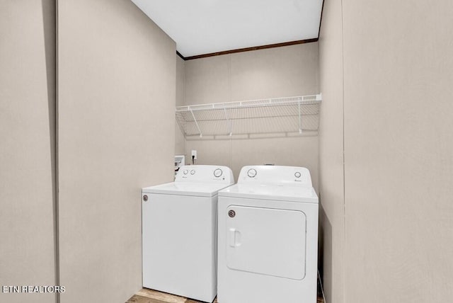 3841 Mcbroom Chapel Rd, Cookeville, TN 38501 - laundry room featuring washer and clothes dryer and ornamental molding