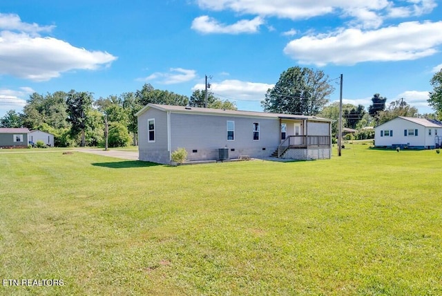 3841 Mcbroom Chapel Rd, Cookeville, TN 38501 - rear view of house featuring a lawn, cooling unit, and crawl space