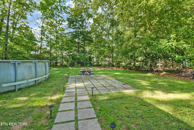 3021 Shawnee Rd, Crossville, TN 38572 - view of yard with an outdoor pool and a patio area