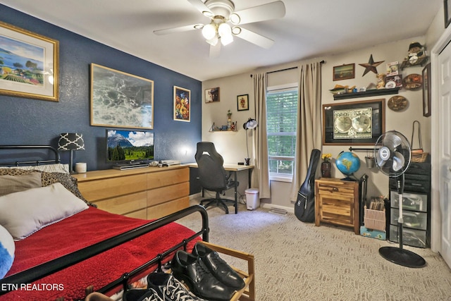 3021 Shawnee Rd, Crossville, TN 38572 - carpeted bedroom with an office area, a ceiling fan, and baseboards