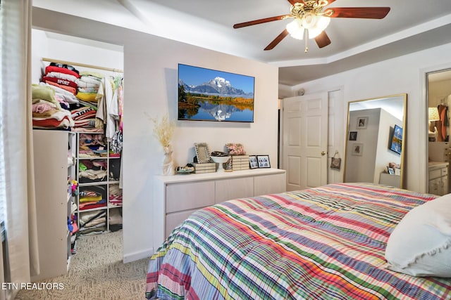 3021 Shawnee Rd, Crossville, TN 38572 - bedroom featuring a spacious closet, a closet, carpet floors, and a ceiling fan