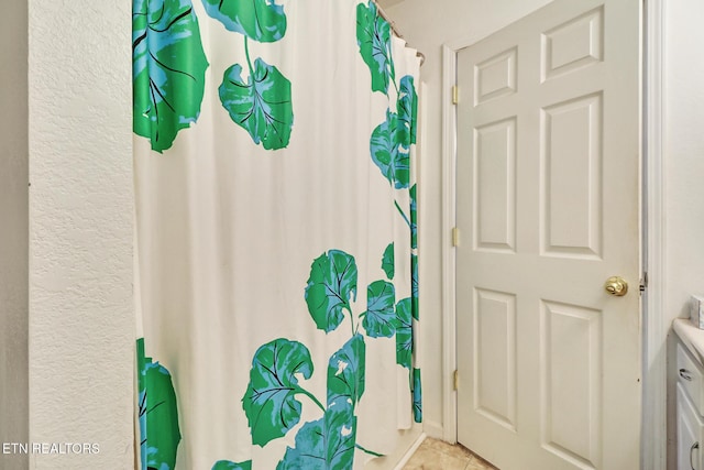 3021 Shawnee Rd, Crossville, TN 38572 - full bathroom with tile patterned floors, a shower with curtain, and vanity