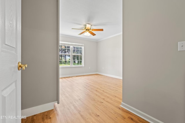 327 Villa Dr Unit 327, Seymour, TN 37865 - empty room with baseboards, crown molding, a ceiling fan, and light wood-style floors