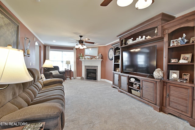 5821 Matalin Ln, Knoxville, TN 37918 - living area featuring ceiling fan, carpet, ornamental molding, baseboards, and a fireplace with flush hearth