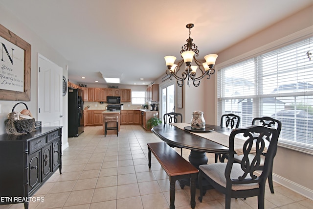 5821 Matalin Ln, Knoxville, TN 37918 - dining space featuring light tile patterned floors, a chandelier, recessed lighting, and baseboards