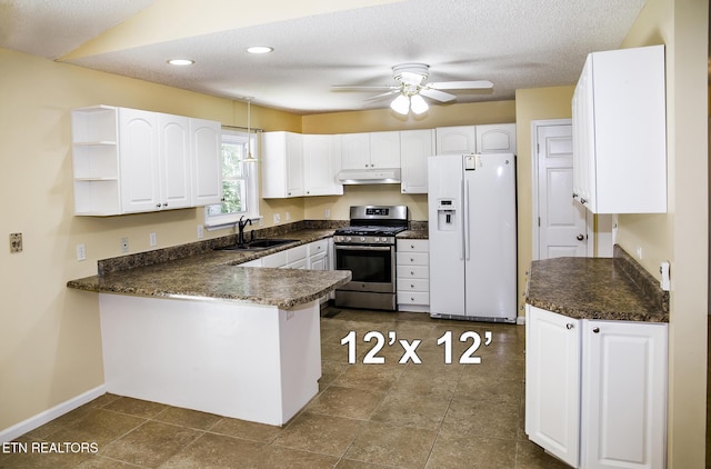 247 Lakeview Dr, Crossville, TN 38558 - kitchen with white refrigerator with ice dispenser, stainless steel range with gas stovetop, under cabinet range hood, a sink, and a peninsula