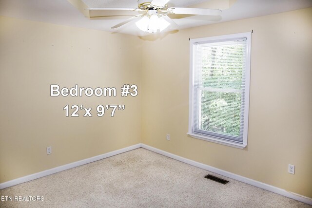 247 Lakeview Dr, Crossville, TN 38558 - spare room with carpet floors, baseboards, and ceiling fan